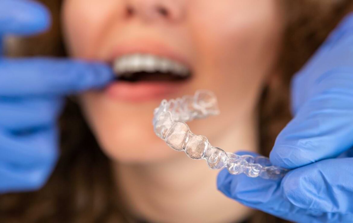 The More You Know: What’s the Difference Between Invisalign & Clear Braces?
